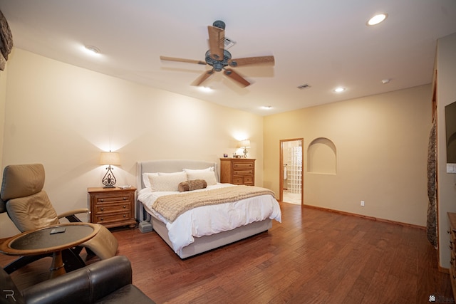 bedroom with dark wood-type flooring and ceiling fan