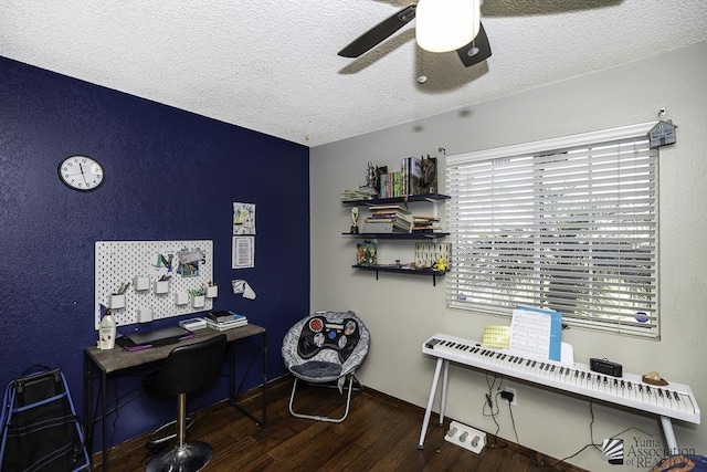 office with ceiling fan, a textured ceiling, baseboards, and wood finished floors