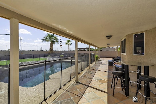 view of patio with a fenced backyard and a fenced in pool