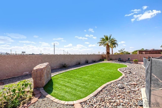 view of yard featuring a fenced backyard