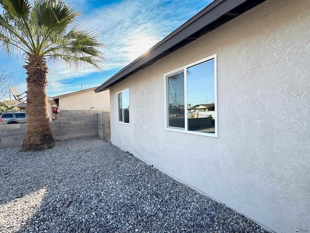 view of property exterior featuring a patio area