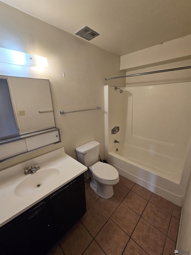 full bathroom with tile patterned floors, vanity, toilet, and bathing tub / shower combination