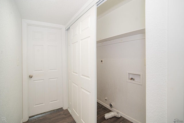 laundry area featuring dark hardwood / wood-style floors and hookup for a washing machine