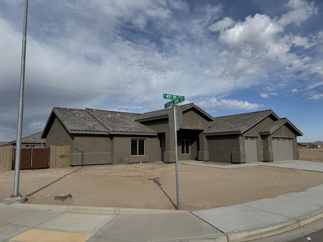 view of front of property featuring a garage