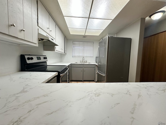 kitchen featuring white cabinets, sink, and appliances with stainless steel finishes