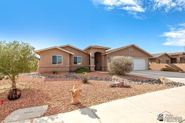 single story home with a garage