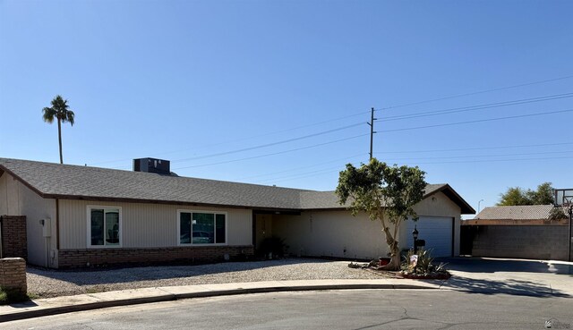 single story home with a garage