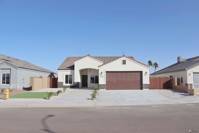 view of front of property with a garage