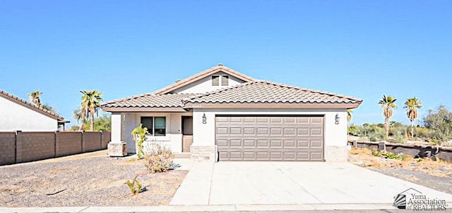 view of front of house with a garage