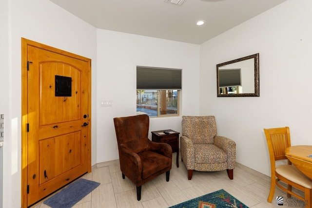 sitting room featuring visible vents and recessed lighting