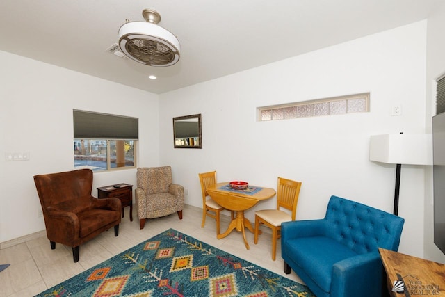 sitting room featuring tile patterned floors