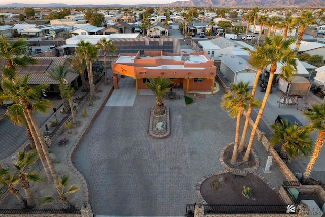 drone / aerial view with a residential view and a mountain view