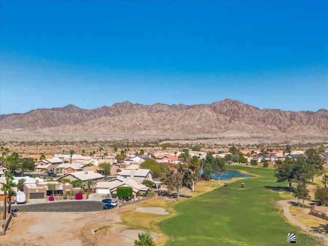 mountain view featuring view of golf course and a residential view