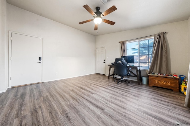 home office with ceiling fan, baseboards, and wood finished floors