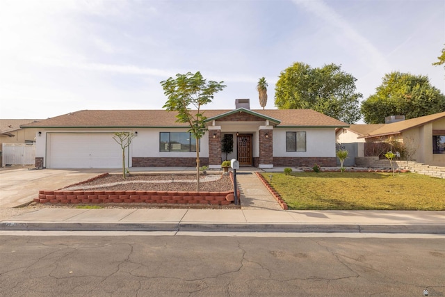 ranch-style home with a garage and a front lawn