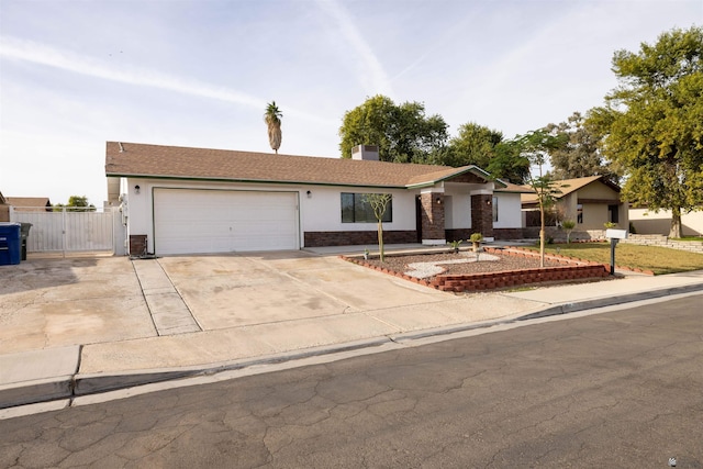 ranch-style house featuring a garage