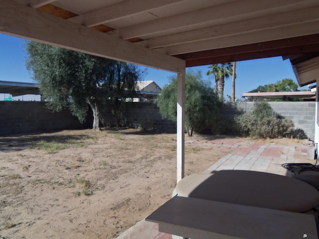 view of yard featuring a patio and a fenced backyard