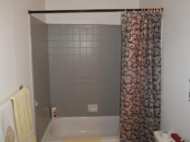 full bathroom with shower / tub combo with curtain