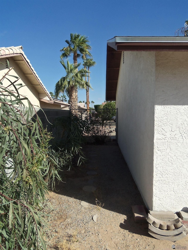 view of home's exterior with stucco siding