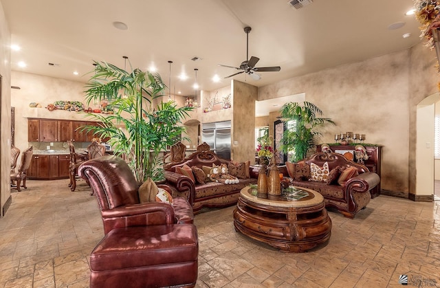 living room featuring ceiling fan