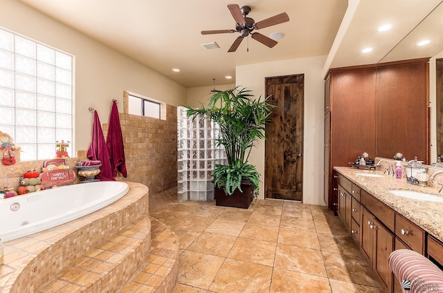 bathroom featuring shower with separate bathtub, vanity, and ceiling fan