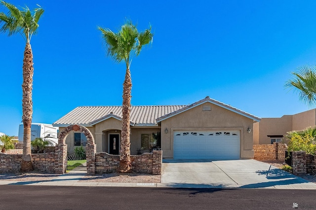 view of front of home with a garage