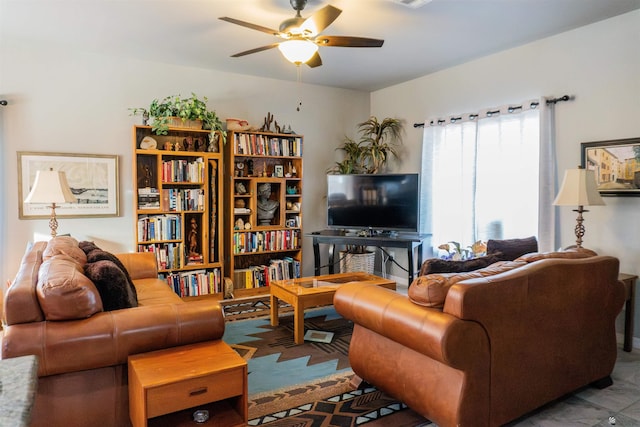 living room with ceiling fan