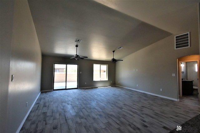 unfurnished living room with wood finished floors, visible vents, and a ceiling fan