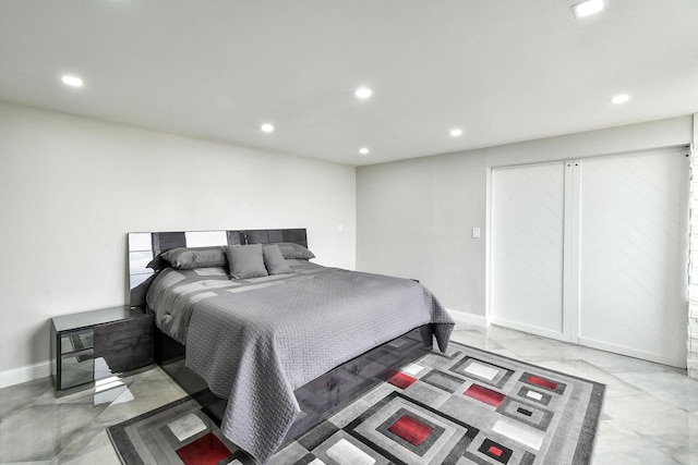 bedroom with baseboards and recessed lighting