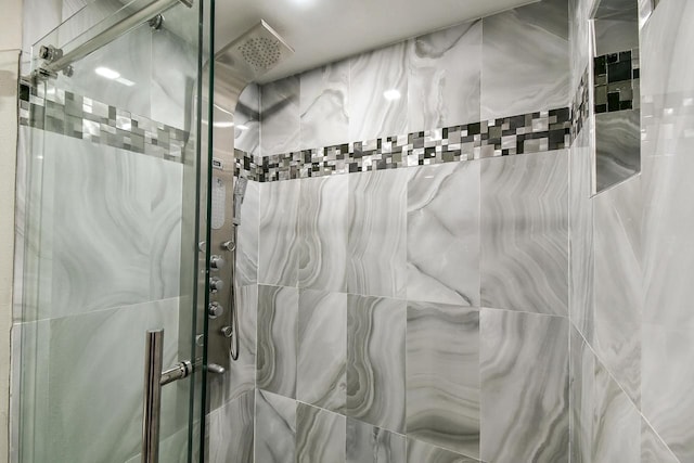 bathroom featuring a stall shower