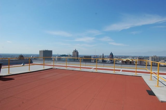 view of patio / terrace featuring a city view