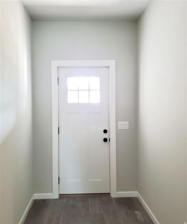 doorway to outside featuring hardwood / wood-style flooring