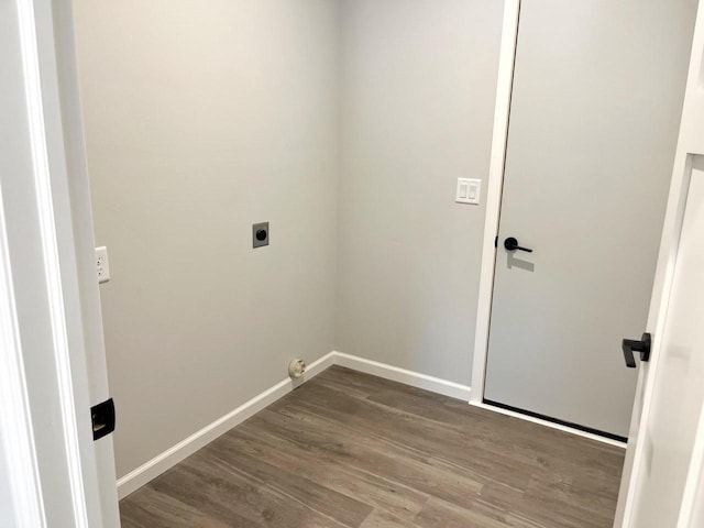 washroom with hookup for an electric dryer and hardwood / wood-style floors