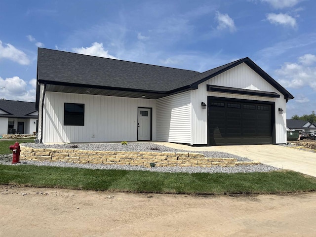 modern farmhouse featuring a garage