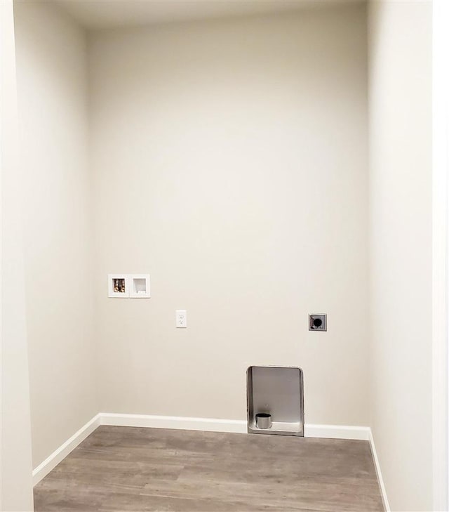 laundry room featuring electric dryer hookup, washer hookup, and hardwood / wood-style floors