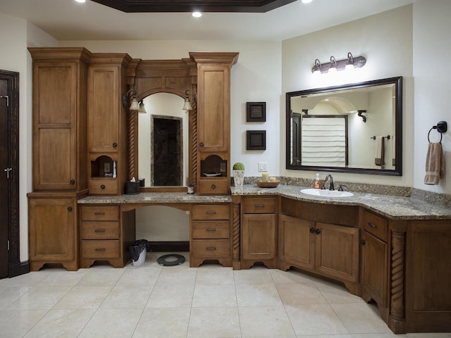 bathroom with vanity and tile floors