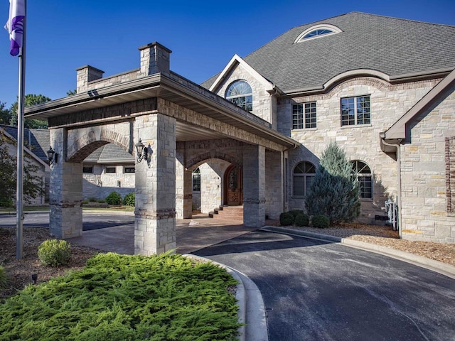 view of french country style house