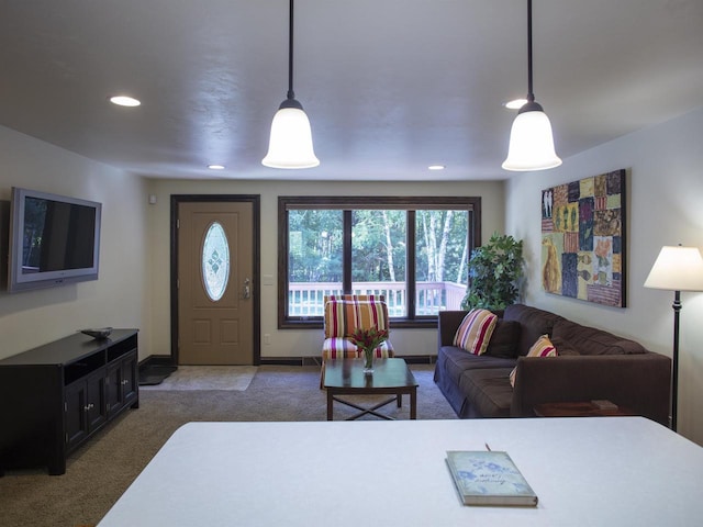 living room featuring dark carpet