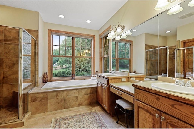 bathroom featuring independent shower and bath, large vanity, and tile flooring