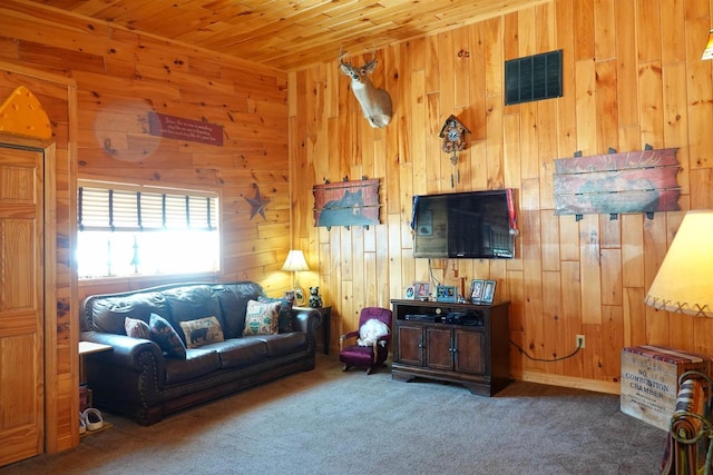 living room featuring wooden ceiling, wooden walls, and dark colored carpet