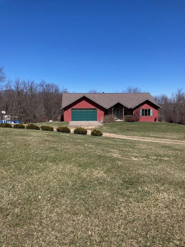 view of yard with a garage