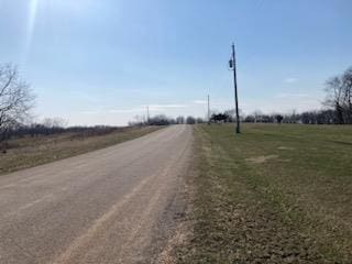 view of street featuring a rural view