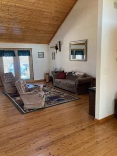 living room with wood ceiling, vaulted ceiling, and hardwood / wood-style flooring