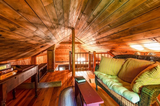 bedroom featuring lofted ceiling, wooden walls, wooden ceiling, and dark hardwood / wood-style floors