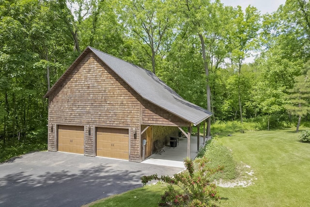 garage with a lawn