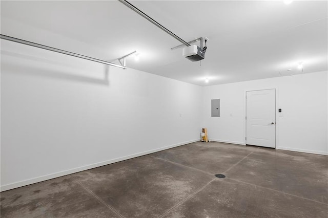 garage featuring a garage door opener and electric panel