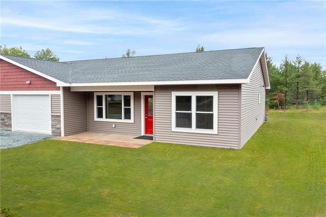 ranch-style house featuring a front lawn