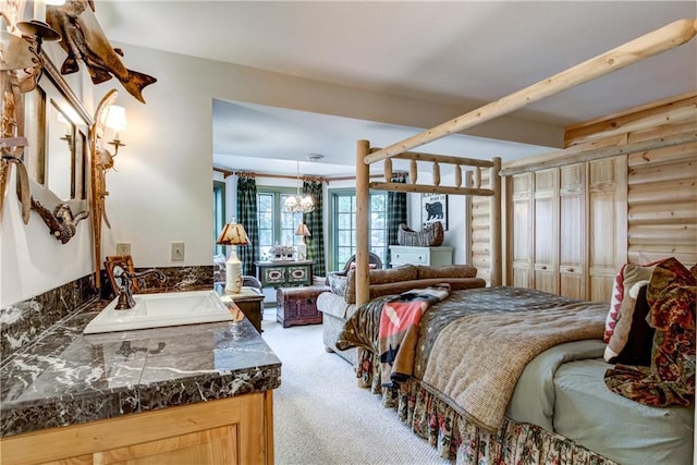 bedroom with light colored carpet, log walls, a closet, and an inviting chandelier