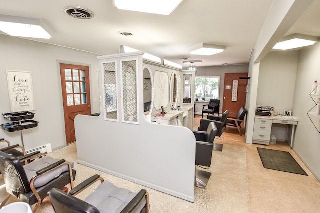 living room featuring a baseboard heating unit