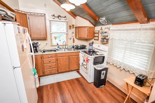 kitchen with vaulted ceiling with beams, dark wood-type flooring, white appliances, sink, and wooden ceiling